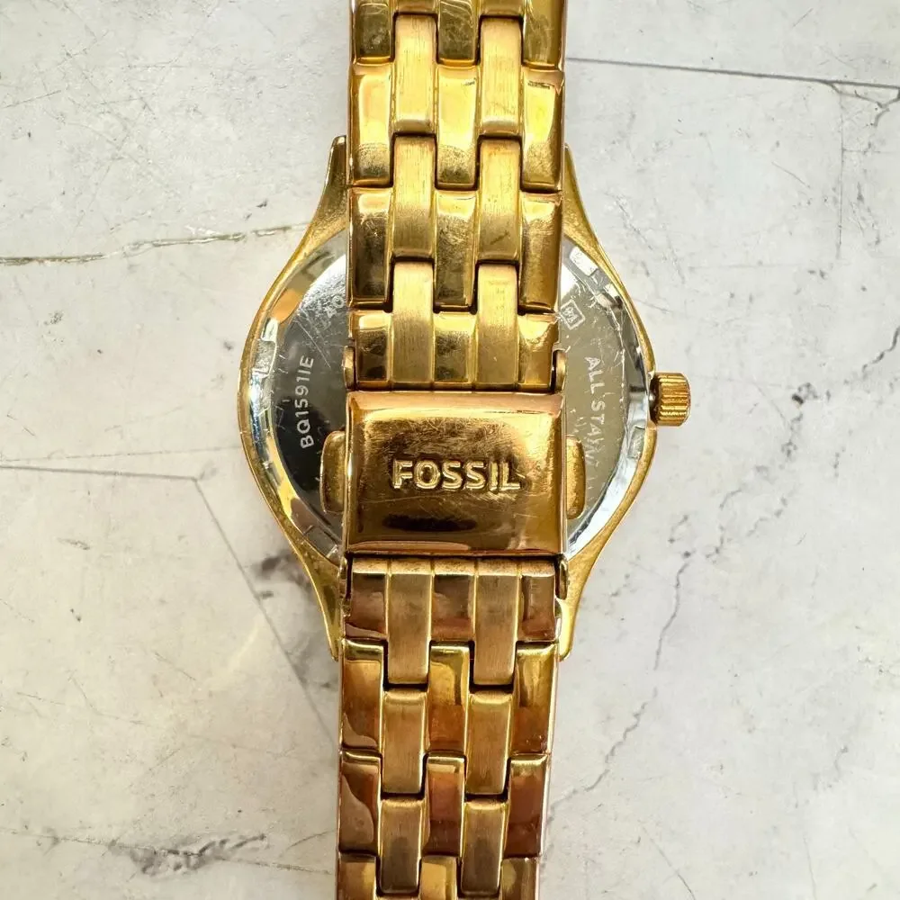 Fossil Women’s Gold Tone Quartz Watch Rose Gold Tone Dial Rhinestone Bracelet